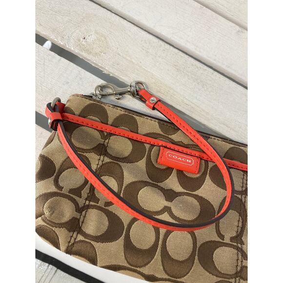 COACH SMALL SIGNATURE PRINT CANVAS, ORANGE TRIM WRISTLET. - Picture 7 of 11